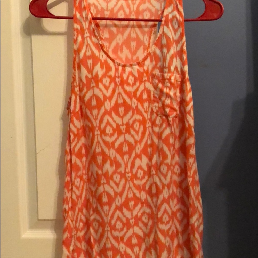 Orange and white tank